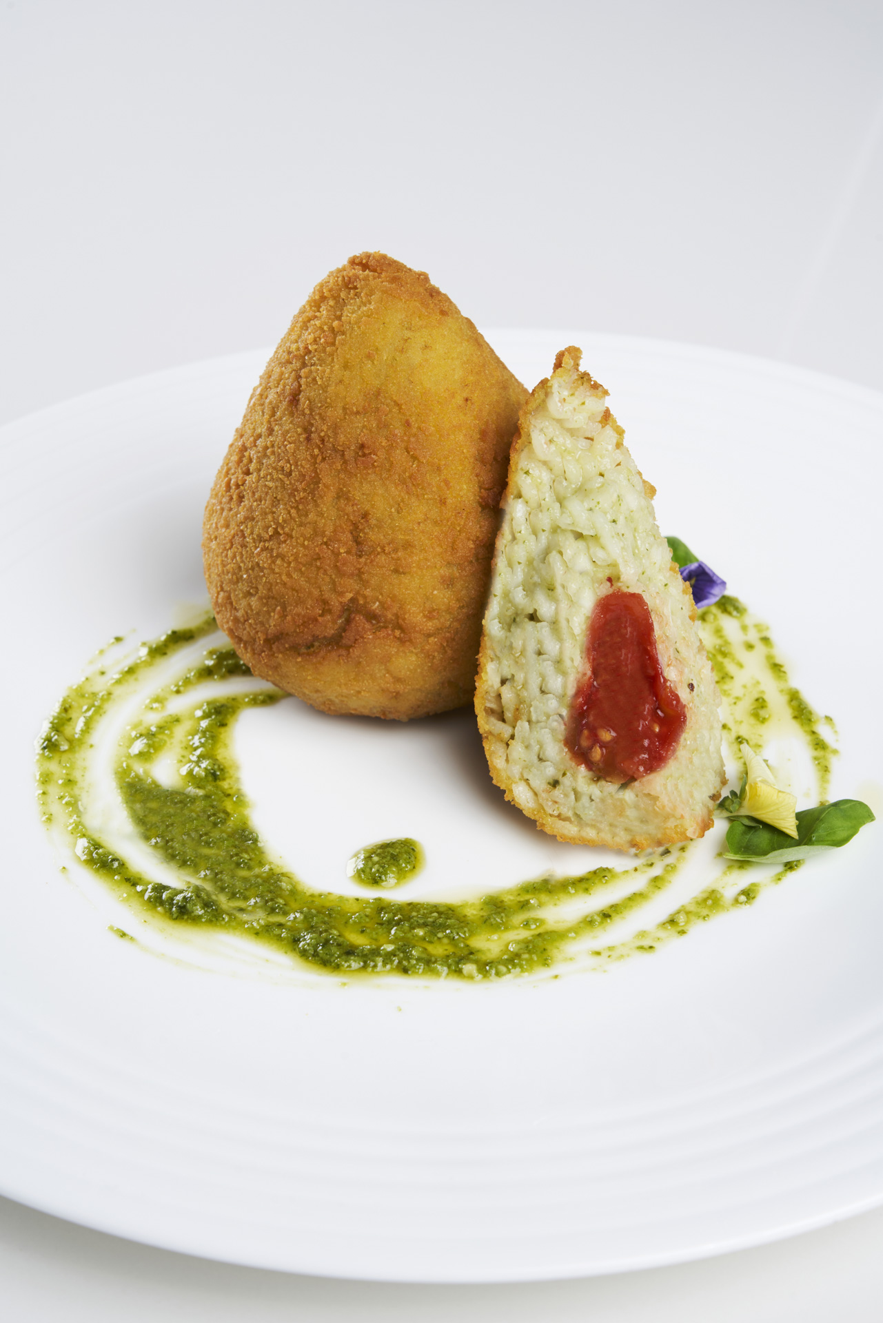 ARANCINI WITH GENOVESE PESTO AND MINI RED TOMATO HEART