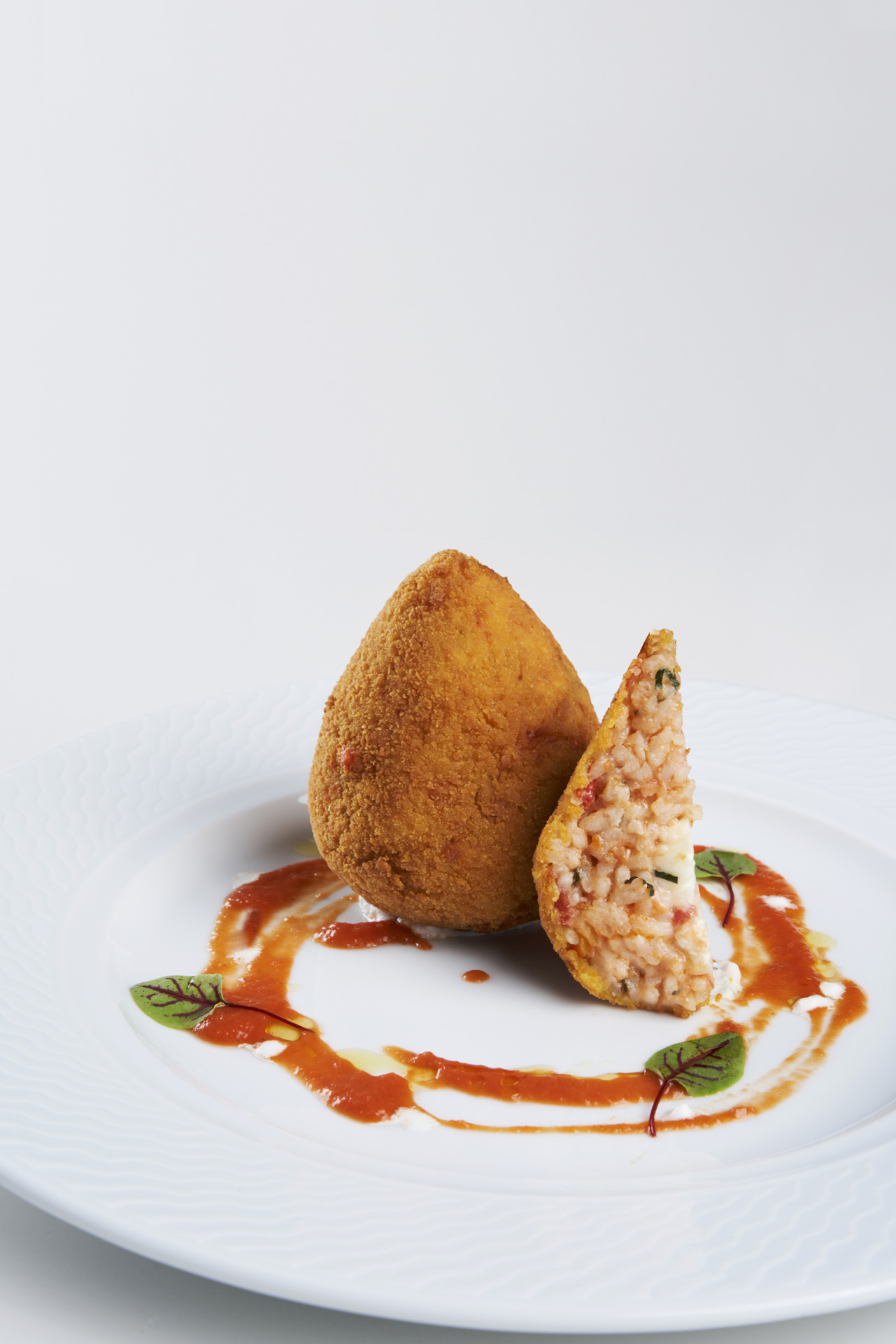 ARANCINI WITH POMODORINA SAUCE  AND BUFFALO MOZZARELLA