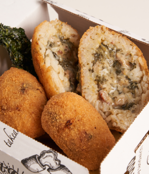 Arancini with friarielli, sausage and smoked scamorza cheese