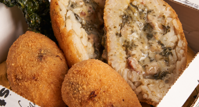 Arancini with friarielli, sausage and smoked scamorza cheese