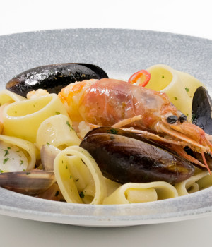 Calamarata pasta with withe wine seafood sauce