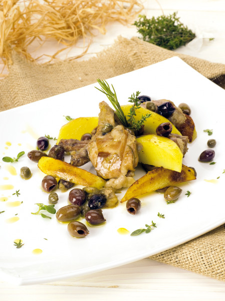 Roast rabbit with pitted Taggiasche olives, capers and potatoes