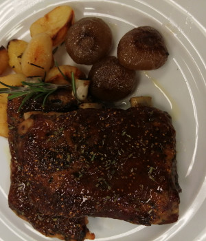 Fig glazed pork ribs with cipolline onions and rosemary potatoes