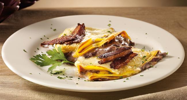 Crêpes with radicchio, fondue and crispy goose breast