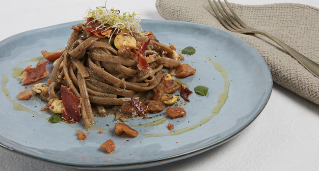 Cocoa Fettuccine with truffle, lupini beans and acacia honey chestnuts