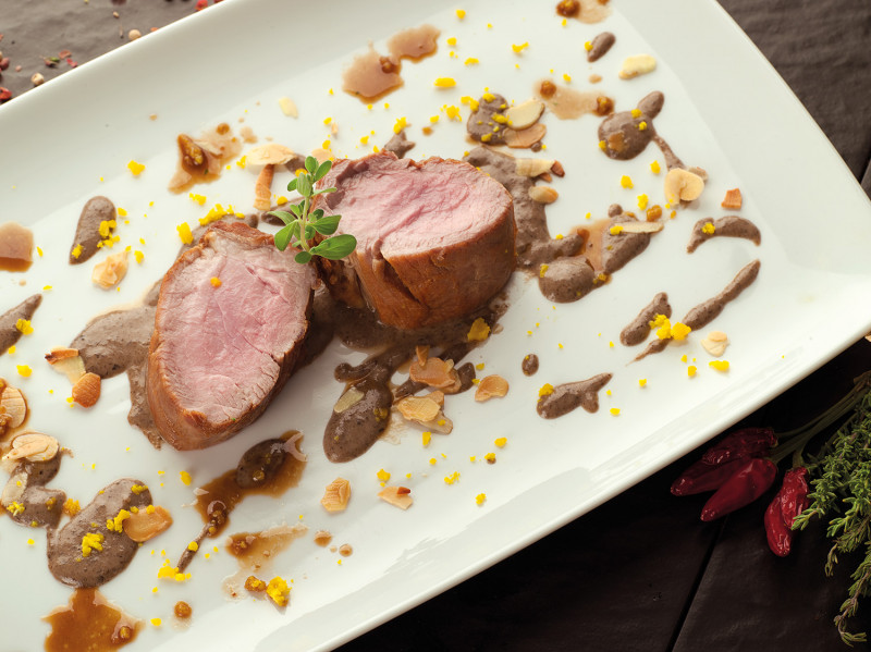 Pork fillet with truffle sauce and toasted almonds