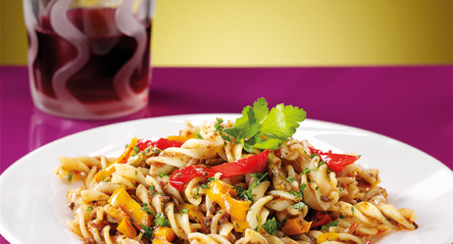 Fusilli pasta with three colours peppers