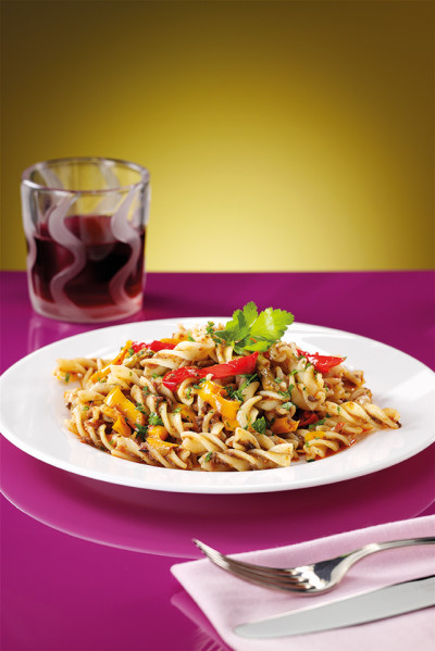 Fusilli pasta with three colours peppers