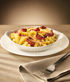 Fusilli pasta with smoked scamorza, guanciale and sage