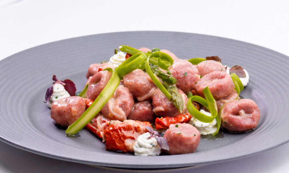 BEETROOT GNOCCHI WITH SOLEGGIATI, ASPARAGUS, AND CHIVE GOAT CHEESE