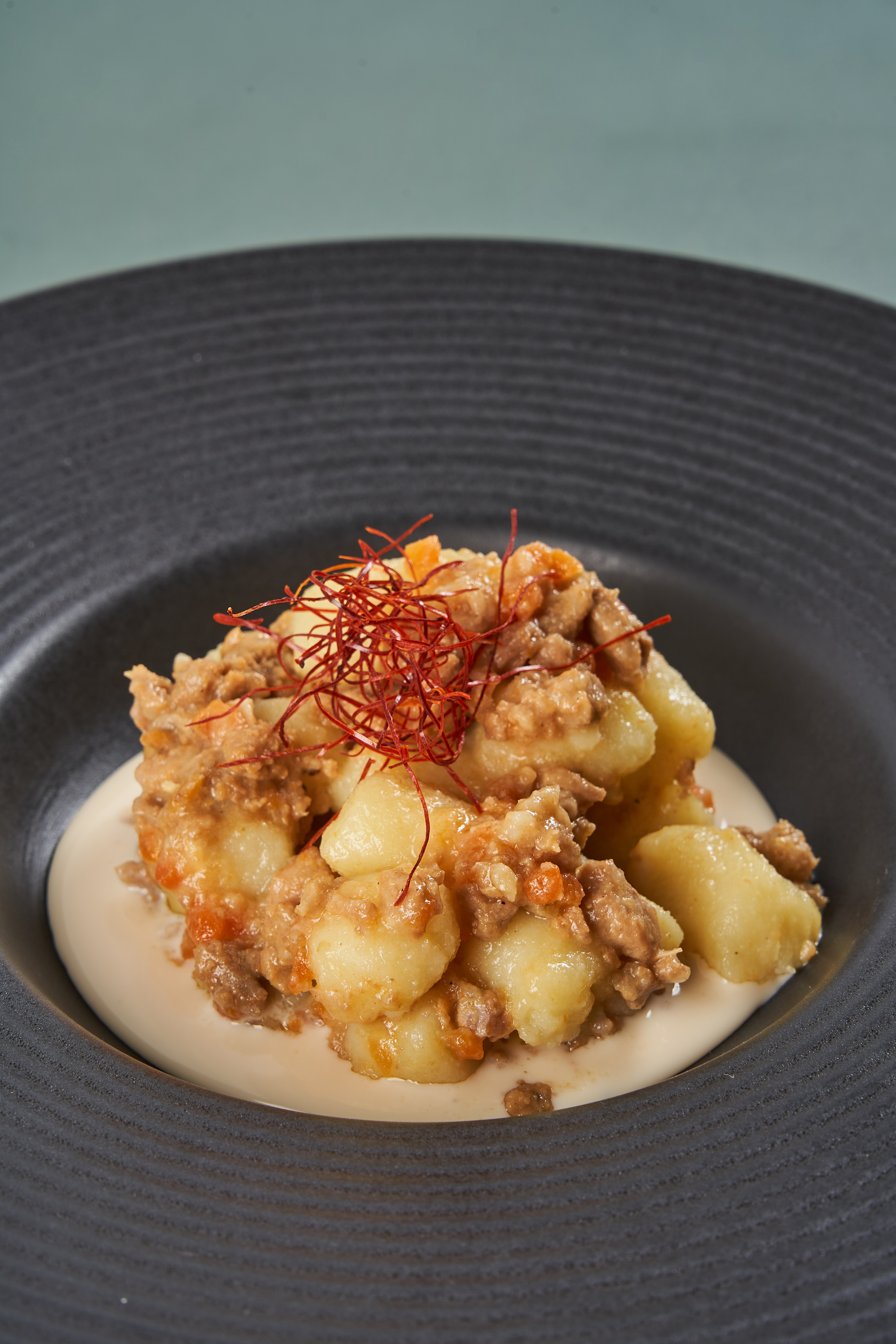 Potato gnocchi with white ragù