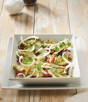 Salad with Roman-style artichokes, radicchio, celery, Dorati tomatoes, walnuts and Fresh Genovese pesto