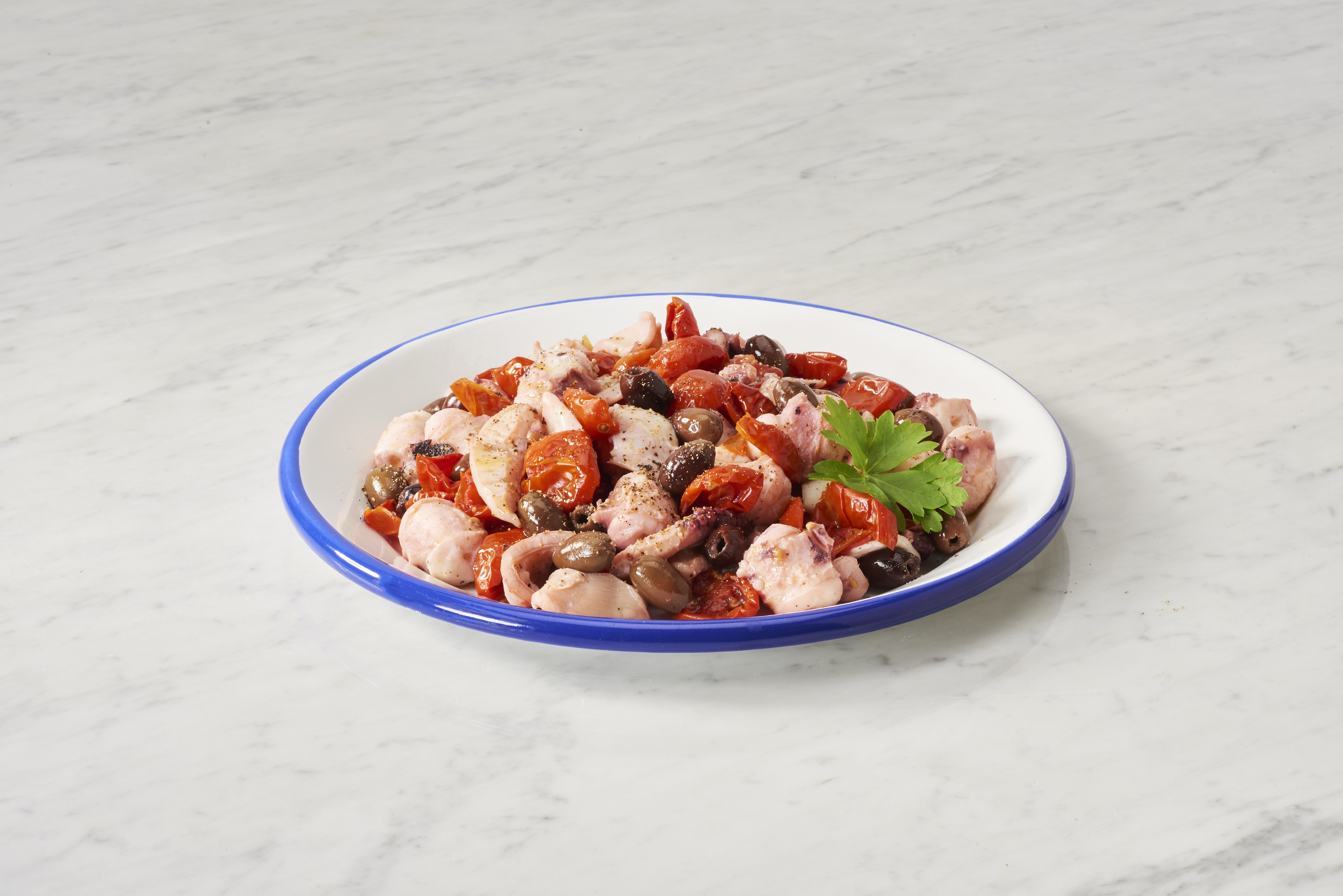 OCTOPUS AND CUTTLEFISH SALAD WITH DORATI CHERRY TOMATOES AND LECCINO OLIVES