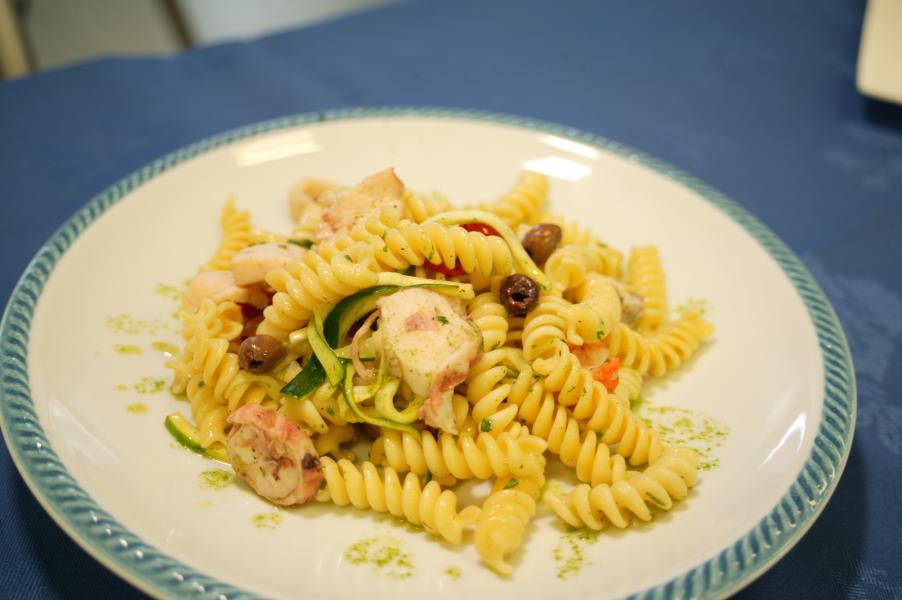Cold pasta salad with fusilli and seafood fantasy