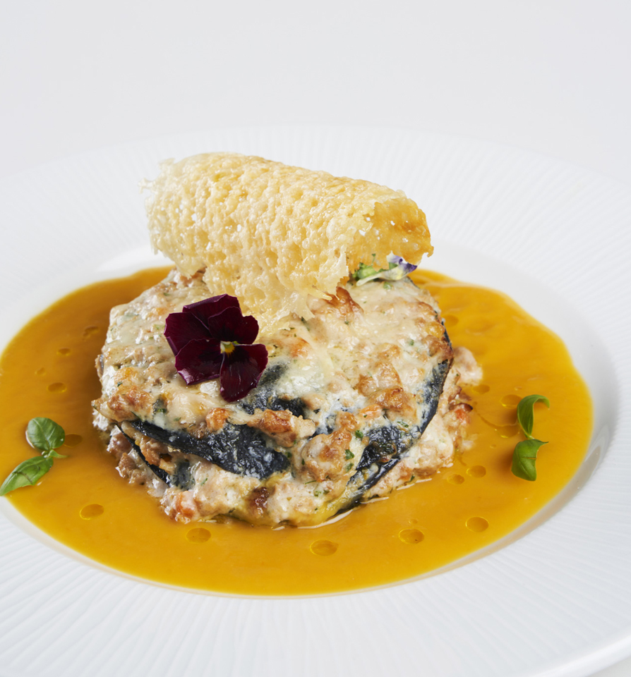 CHARCOAL LASAGNA WITH ÈRAGÙBIANCO, YELLOW  DATTERINI TOMATOES VELOUTÉ AND PAMIGIANO CHIPS