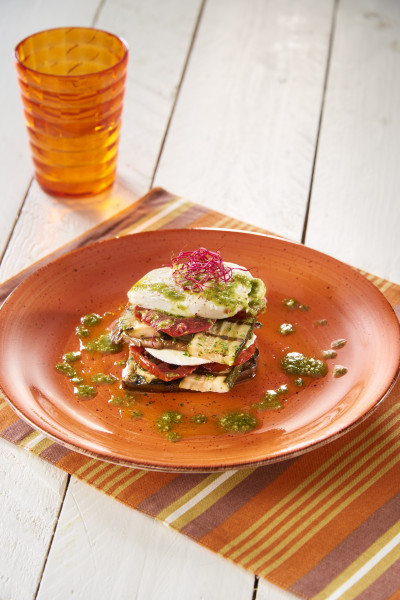MILLEFEUILLE OF VEGETABLES WITH AUBERGINES, COURGETTES, WHEELS OF SEMI-DRIED TOMATOES AND FRESH GENOVESE PESTO