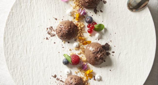 Chocolate mousse with roasted hazelnuts and wild berries