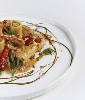 PACCHERI WITH PISTACHIO PESTO,  SOLEGGIATI TOMATOES AND PRAWNS