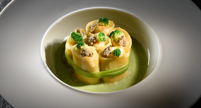 PACCHERI PASTA STUFFED WITH GROUPER , POTATOES AND CLAMS ON A BROCCOLI VELOUTÈ