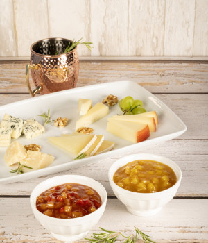Platter of cheese with Pineapple and Sweet Pepper Chutney and Mango and Pink Pepper Chutney