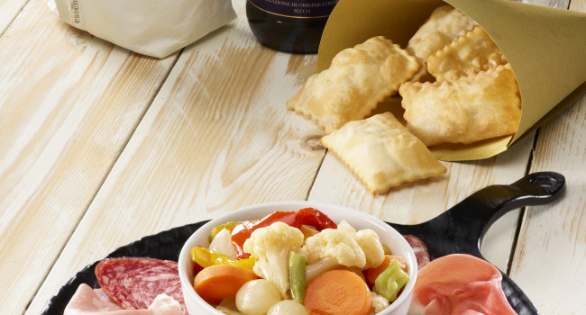 Rustic Platter from Emilia with Mixed Cold Cuts, Pickled Vegetables, Tigella Flatbreads and Fried Dough Parcels