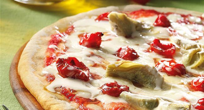 Pizza with grilled artichokes, cherry tomatoes and pecorino cheese