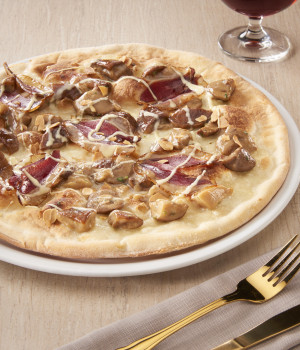 Pizza with Boletus , Goose breast, Fondue and almonds