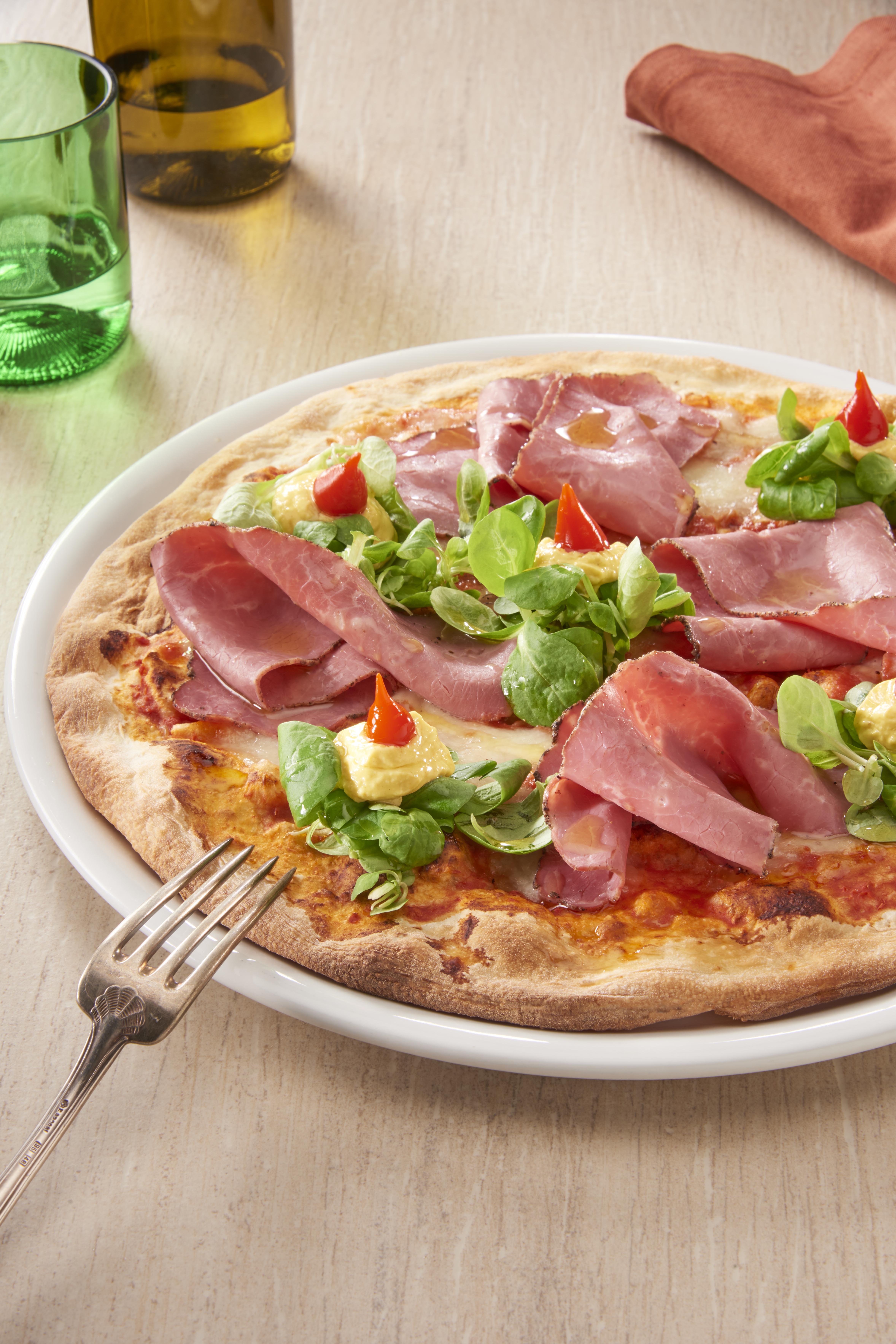 PIZZA  WITH PASTRAMI, MANGO CURRY GINGER SAUCE AND SWEET RED PEPPERS