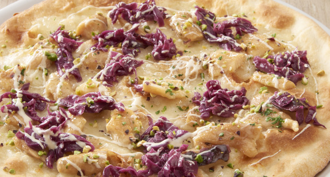 Pizza with Pecorino cheese, porcini mushrooms, red cabbage and pistacchios