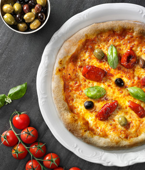 Pizza with Red pesto, Soleggiati tomato and olives
