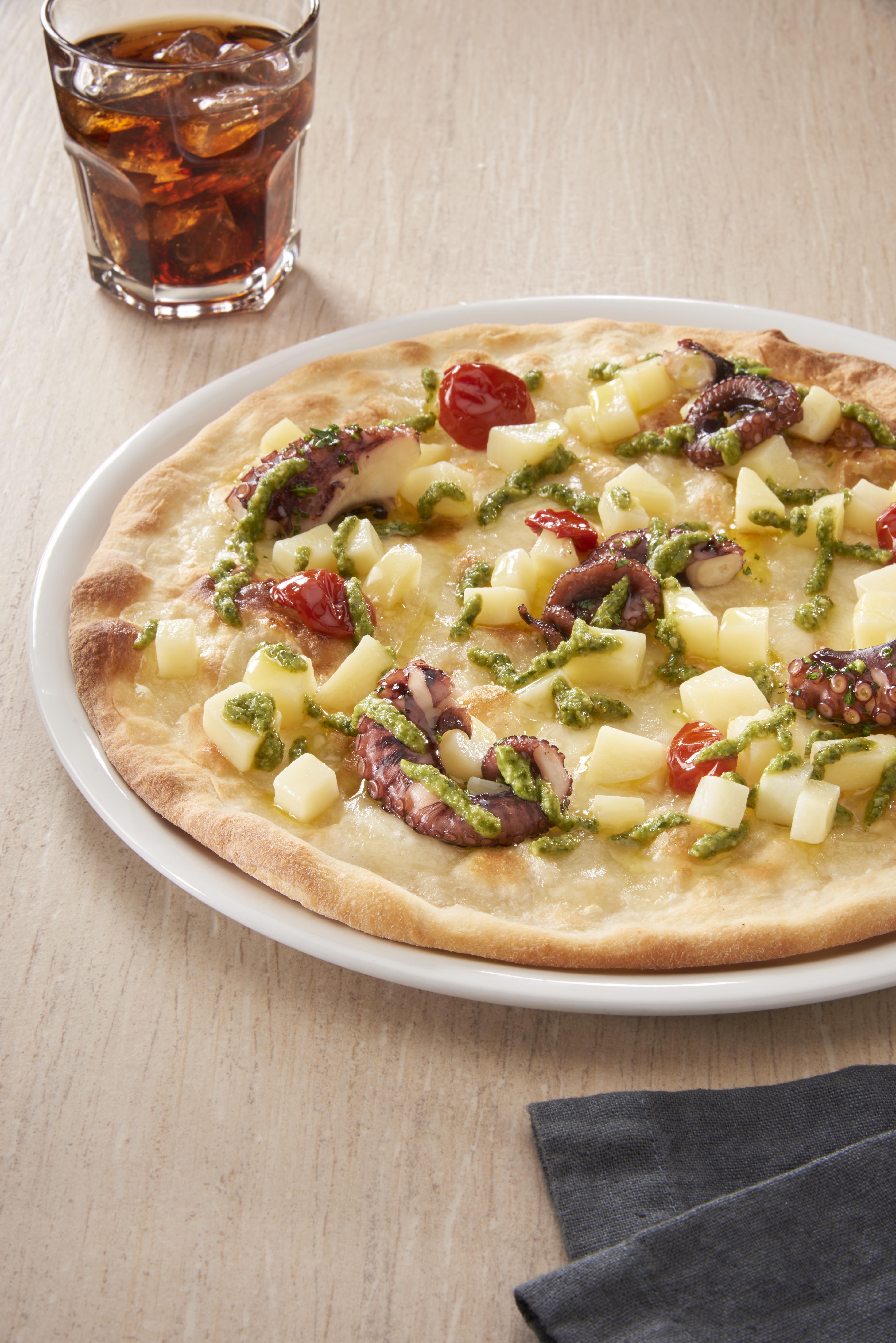 Pizza with octopus,potato,genovese pesto and Dorati tomatoes