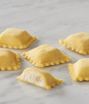 Pequeños raviolis de azafrán con boletus