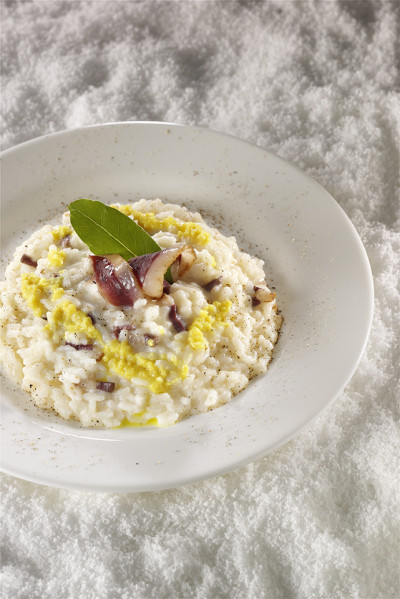 Risotto with stracchino cheese, smoked goose and pear ginger sauce