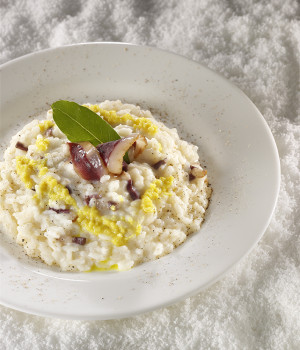 Risotto with stracchino cheese, smoked goose and pear ginger sauce