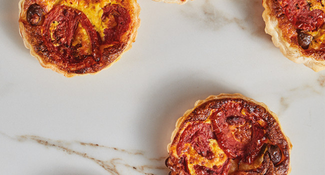Anchovy tomato wheels and olive tartlets