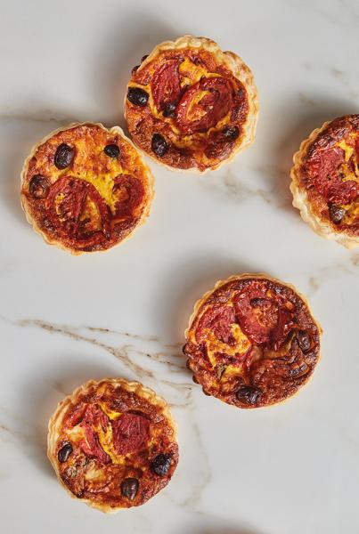 Anchovy tomato wheels and olive tartlets