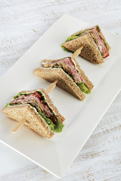 Trio of sandwiches with ham and sautéed field mushrooms
