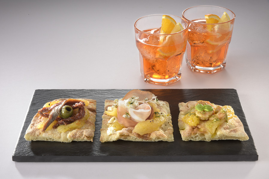 TRIPTYCH OF PIZZA WITH YELLOW TOMATOES