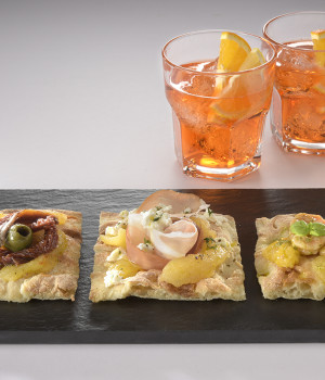 TRIPTYCH OF PIZZA WITH YELLOW TOMATOES