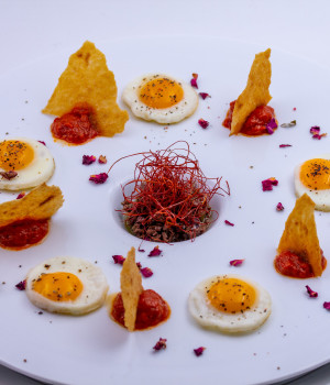 Quail eggs with tapenade and ‘Nduja