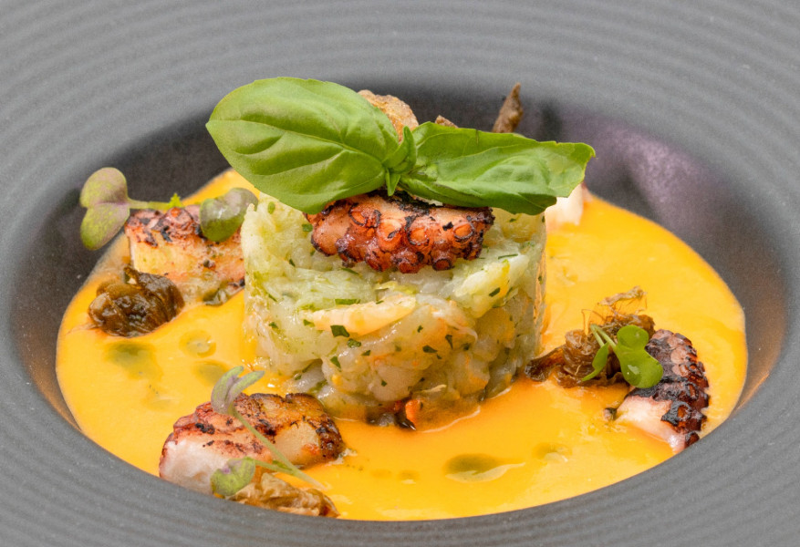 POTATO AND RED PESTO VELOUTÈ WITH OCTOPUS AND PRAWNS