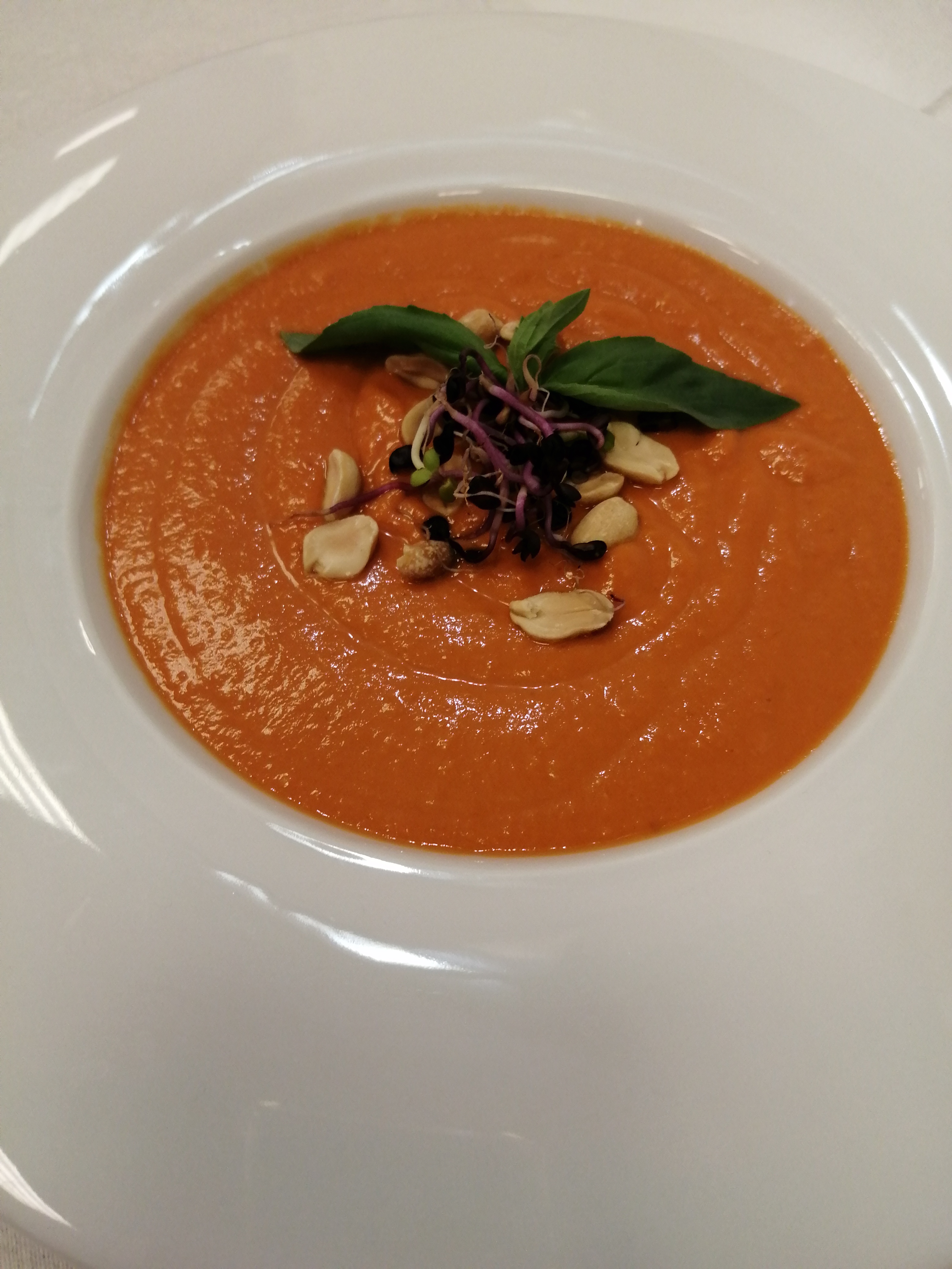 Tomato Veloutè with peanut butter and coconut