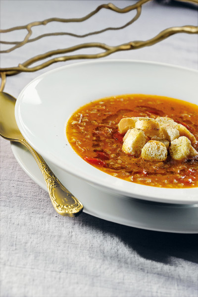 Farro soup with prosciutto and croutons
